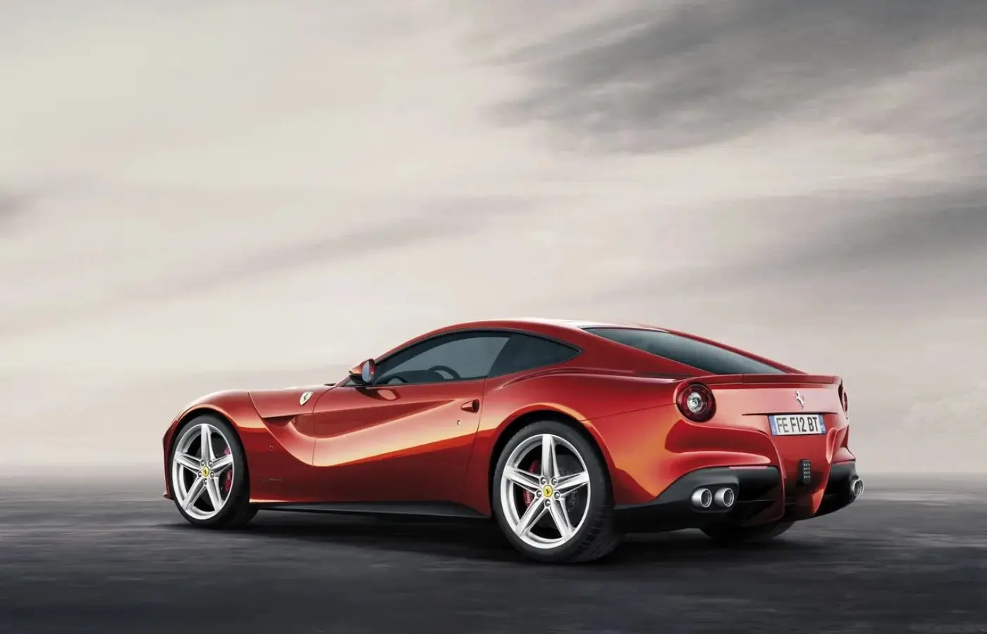 Ferrari’s New EV Strategy involves working alongside petrol and hybrid models instead of replacing them. Featured Image